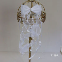 F1489 Comb with White Bow & Curly Ribbons (diamante middle)